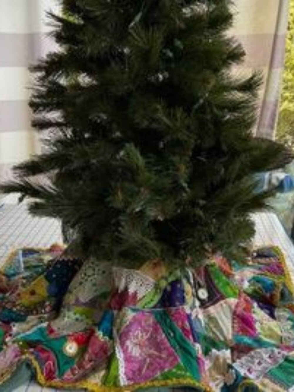 Hhandmade crazy quilt tree skirt w/ many embellishments jewel tones